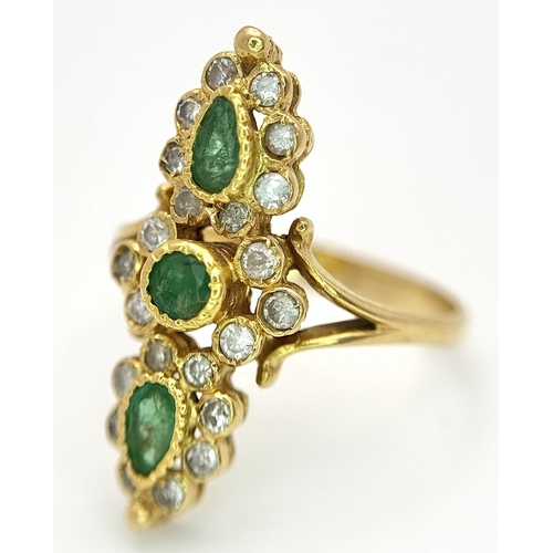 6 - AN 18K YELLOW GOLD, DIAMOND AND EMERALD SET, MARQUISE SHAPED, COCKTAIL RING. 4.7G, SIZE Q. TAN 2002