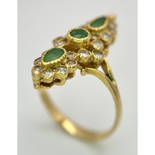 6 - AN 18K YELLOW GOLD, DIAMOND AND EMERALD SET, MARQUISE SHAPED, COCKTAIL RING. 4.7G, SIZE Q. TAN 2002