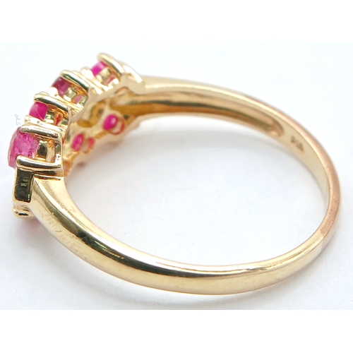 601 - A 9K YELLOW GOLD, DIAMOND AND RUBY SET, 3 ROW RING. 2.4G, SIZE P. SC2045