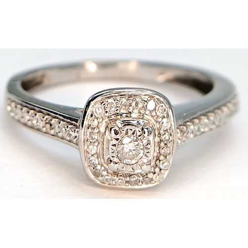 608 - A 9K WHITE GOLD, DIAMOND SET RING. 2.4G, SIZE O. SC 2048