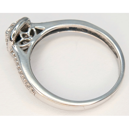 608 - A 9K WHITE GOLD, DIAMOND SET RING. 2.4G, SIZE O. SC 2048