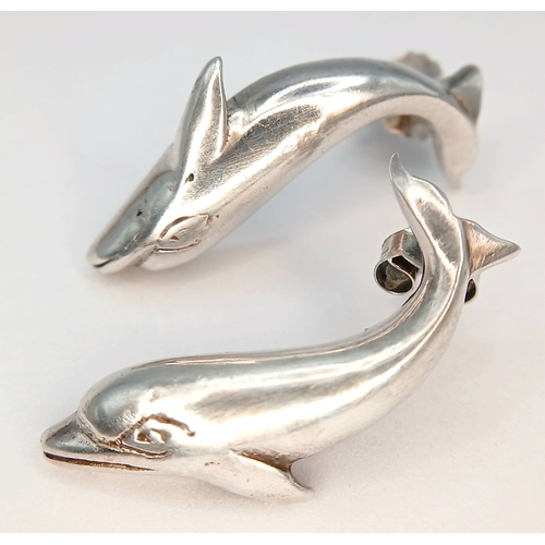 1234 - A Pair of 925 Silver Dolphin Stud Earrings. Approx 2.5cm length. Total weight: 4.91g.