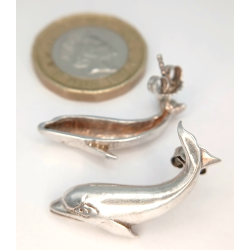 1234 - A Pair of 925 Silver Dolphin Stud Earrings. Approx 2.5cm length. Total weight: 4.91g.