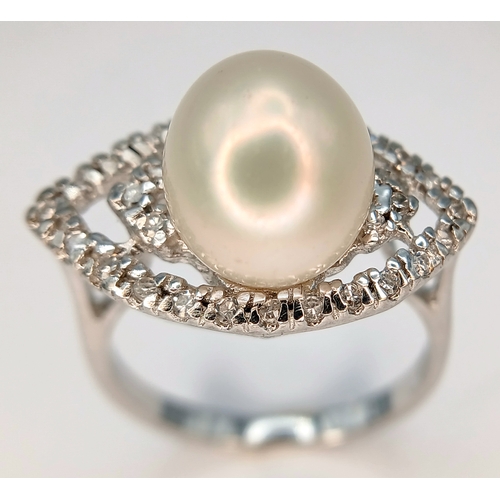 1255 - A 925 Silver Pearl and Clear Stone Set Ring. Size N 1/2. Total weight: 3.65g.