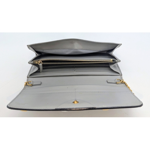 585 - A Scarce Vintage Fendi Grey Leather Shoulder Bag with original box and dustcover. 19cm wide.