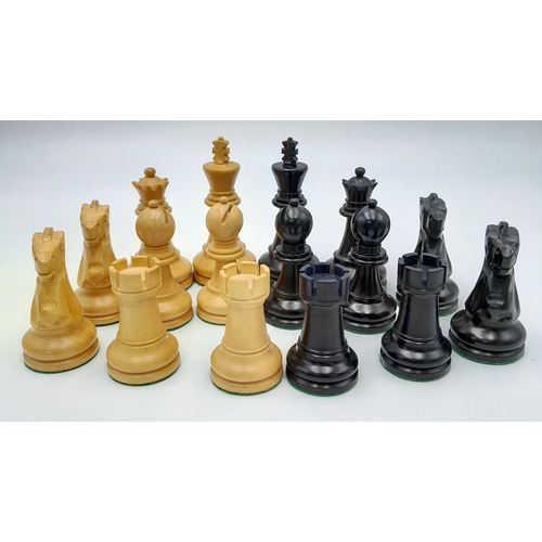 597 - An Ebony and Boxwood Set of Chess Pieces. All having a felt bottom and of Indian origin. 3.25