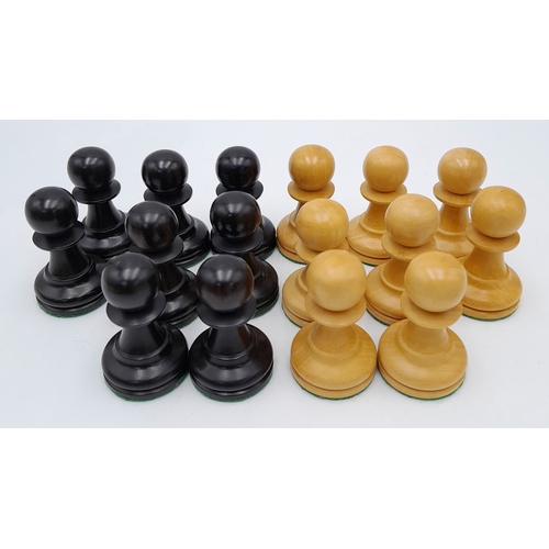 597 - An Ebony and Boxwood Set of Chess Pieces. All having a felt bottom and of Indian origin. 3.25