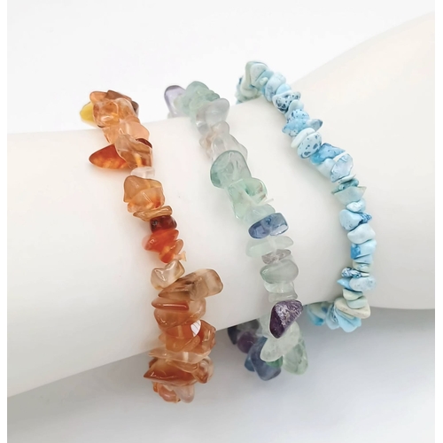 1210 - A Collection of Three Unworn Stretch Fit Semi-Precious Gemstone Bracelets Comprising: 1) Turquoise, ... 