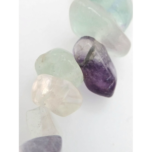 1210 - A Collection of Three Unworn Stretch Fit Semi-Precious Gemstone Bracelets Comprising: 1) Turquoise, ... 