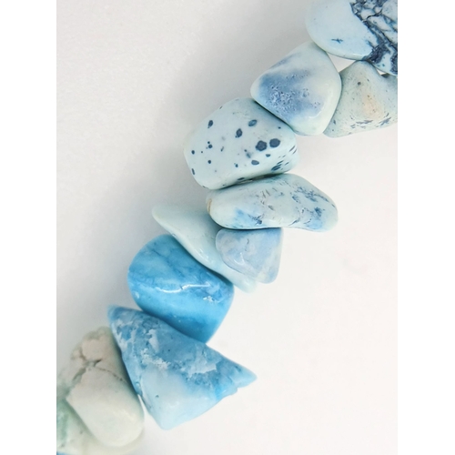 1210 - A Collection of Three Unworn Stretch Fit Semi-Precious Gemstone Bracelets Comprising: 1) Turquoise, ... 