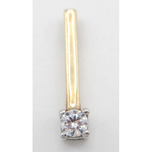 550 - A Vibrant 9k Yellow Gold (Tests as) Cubic Zirconia Solitaire Bar Pendant. 1.5cm Length. Set with a 3... 