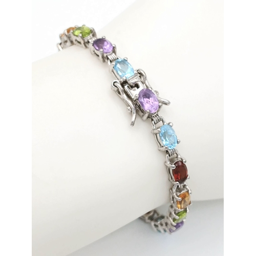557 - A Pretty Sterling Silver and Multi-Colour Semi-Precious Gemstone Set Bracelet-19cm Length. Set with ... 