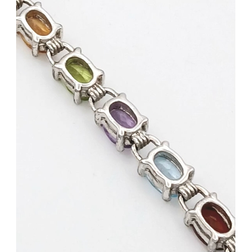557 - A Pretty Sterling Silver and Multi-Colour Semi-Precious Gemstone Set Bracelet-19cm Length. Set with ... 