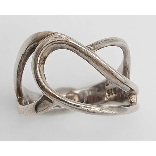 1223 - A 925 Silver Modernist Openwork Ring. Size P, 4.43g weight.