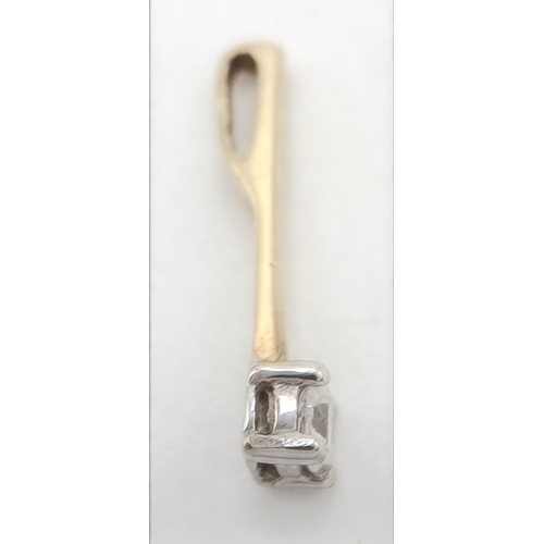 550 - A Vibrant 9k Yellow Gold (Tests as) Cubic Zirconia Solitaire Bar Pendant. 1.5cm Length. Set with a 3... 