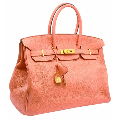 An Hermes Birkin 35 Crevette Swift Leather Handbag. Crevette pink Swift leather exterior with gold-toned hardware, double rolled top handles, leather sangles, hanging clochette with keys and padlock, protective base studs and turn-lock closure. Matching leather interior with one main compartment, a zipped side pocket and an open side pocket. In very good condition overall. Approx 35cm length x 26cm height x 19cm depth. Q Stamp (2013). Please see photos or request a condition report. Ref: H007.