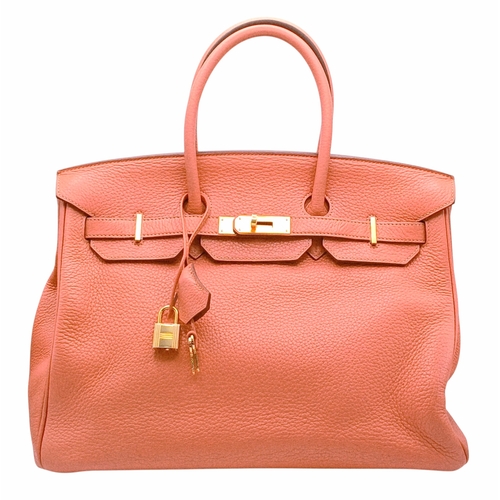 19 - An Hermes Birkin 35 Crevette Swift Leather Handbag. Crevette pink Swift leather exterior with gold-t... 