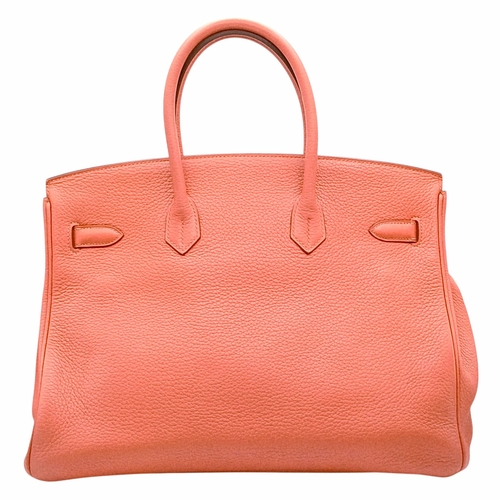 19 - An Hermes Birkin 35 Crevette Swift Leather Handbag. Crevette pink Swift leather exterior with gold-t... 