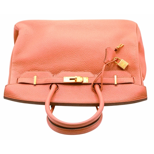 19 - An Hermes Birkin 35 Crevette Swift Leather Handbag. Crevette pink Swift leather exterior with gold-t... 