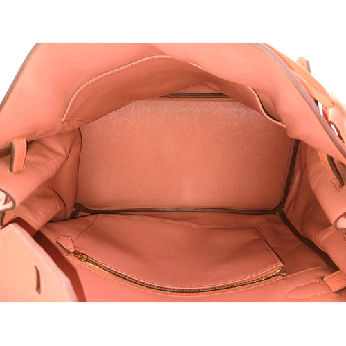 19 - An Hermes Birkin 35 Crevette Swift Leather Handbag. Crevette pink Swift leather exterior with gold-t... 