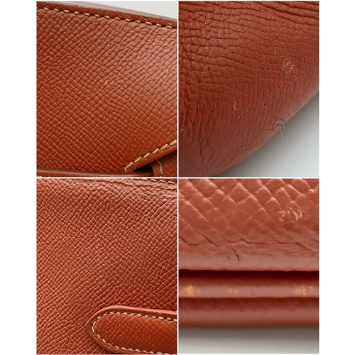 33 - An Hermès Brick Red Courchevel Birkin 35 Handbag. Brick red Courchevel leather exterior with silver-... 