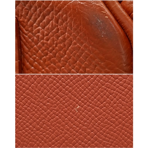33 - An Hermès Brick Red Courchevel Birkin 35 Handbag. Brick red Courchevel leather exterior with silver-... 