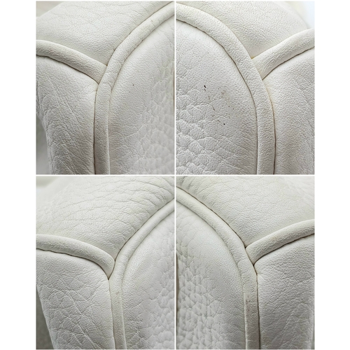 47 - An Hermès White Togo Birkin 35 Handbag. White grained calfskin leather exterior with gold-toned hard... 