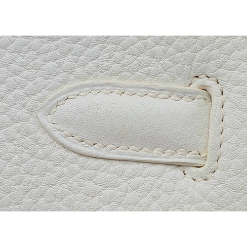 47 - An Hermès White Togo Birkin 35 Handbag. White grained calfskin leather exterior with gold-toned hard... 