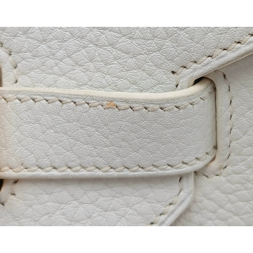 47 - An Hermès White Togo Birkin 35 Handbag. White grained calfskin leather exterior with gold-toned hard... 