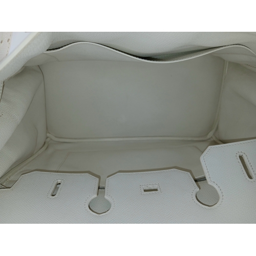 5 - An Hermès White Epsom Birkin 35 Handbag. White Epsom leather exterior with silver-toned hardware, do... 