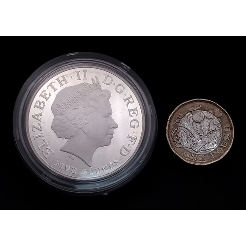 604 - A Royal Mint Sterling Silver London Olympics Commemorative Proof Coin. £5 denomination. 28.28g. Come... 