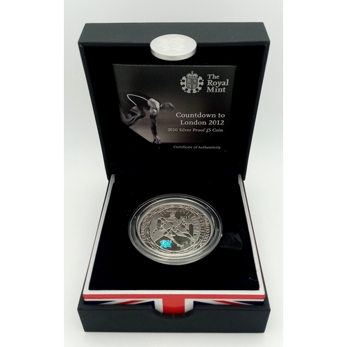604 - A Royal Mint Sterling Silver London Olympics Commemorative Proof Coin. £5 denomination. 28.28g. Come... 