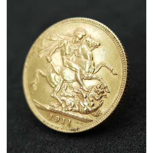 596 - A 1911 George V Full Sovereign Coin. 22k Gold.
