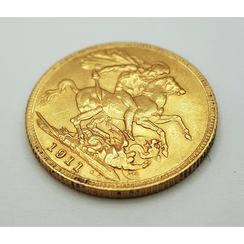 596 - A 1911 George V Full Sovereign Coin. 22k Gold.