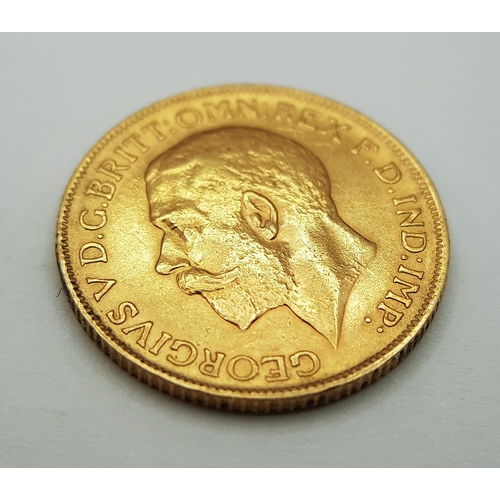 596 - A 1911 George V Full Sovereign Coin. 22k Gold.