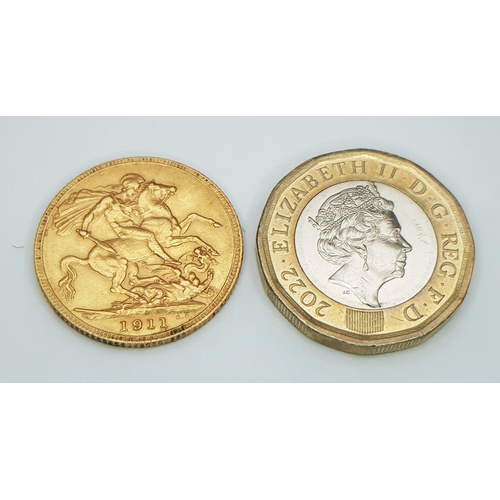 596 - A 1911 George V Full Sovereign Coin. 22k Gold.