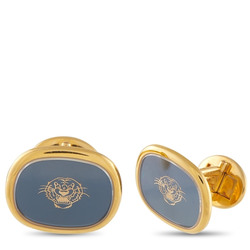 A pair of Patek Philippe 18K Yellow Gold Cufflinks. A fierce tiger motif makes a statement at the center of these Patek Philippe cufflinks. Crafted from 18K Yellow Gold and measures 0.75 inches long by 0.82 inches wide. Good Condition and includes a gift box. Total weight: 27.2 grams. *This item is held at Cadmore USA Office in Pennsylvania, USA and will be shipped from there. Buyers will be responsible for direct shipping payments.*