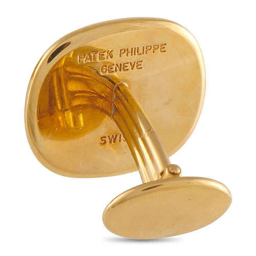 1488 - A pair of Patek Philippe 18K Yellow Gold Cufflinks. A fierce tiger motif makes a statement at the ce... 