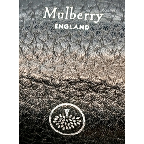 586 - A Mulberry Black Classic Grain Leather Card Holder. Size approx: 10.5cm x 7.7cm. Ref: 28006