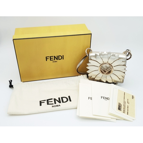 572 - A Fendi Flower Micro Kan I Crossbody Bag. Metallic champagne leather exterior with gold-tone Fendi l... 