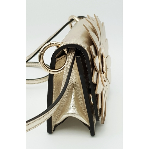 572 - A Fendi Flower Micro Kan I Crossbody Bag. Metallic champagne leather exterior with gold-tone Fendi l... 