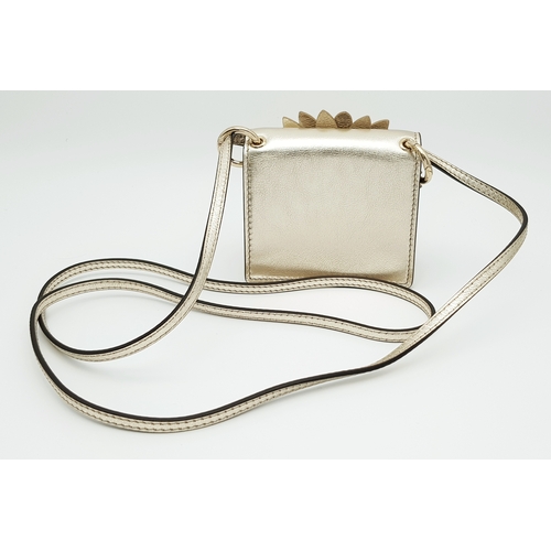 572 - A Fendi Flower Micro Kan I Crossbody Bag. Metallic champagne leather exterior with gold-tone Fendi l... 