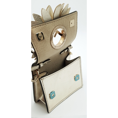572 - A Fendi Flower Micro Kan I Crossbody Bag. Metallic champagne leather exterior with gold-tone Fendi l... 