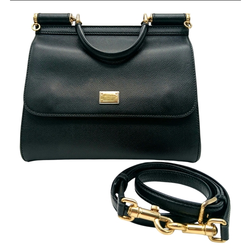 565 - A Dolce & Gabbana Dauphine Small Miss Sicily Satchel Bag. Black grained leather exterior with gold-t... 