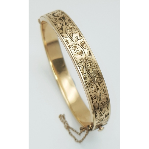 14 - Vintage 9 CARAT GOLD BANGLE with Metal Core. Complete with Safety Chain. Beautiful decoration to sid... 
