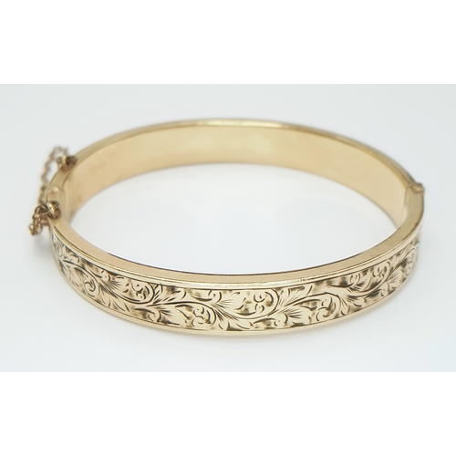 14 - Vintage 9 CARAT GOLD BANGLE with Metal Core. Complete with Safety Chain. Beautiful decoration to sid... 