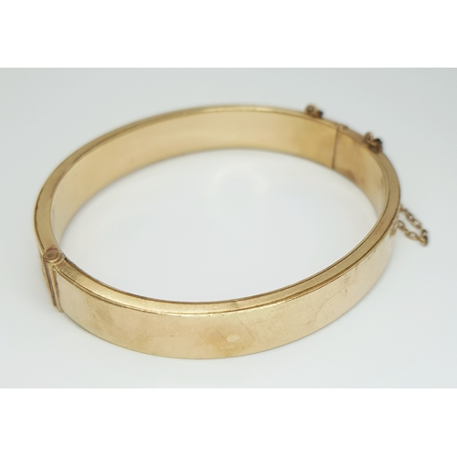 14 - Vintage 9 CARAT GOLD BANGLE with Metal Core. Complete with Safety Chain. Beautiful decoration to sid... 