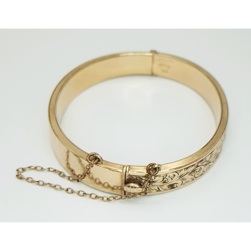 14 - Vintage 9 CARAT GOLD BANGLE with Metal Core. Complete with Safety Chain. Beautiful decoration to sid... 