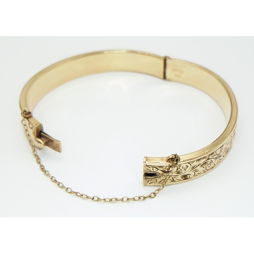 14 - Vintage 9 CARAT GOLD BANGLE with Metal Core. Complete with Safety Chain. Beautiful decoration to sid... 