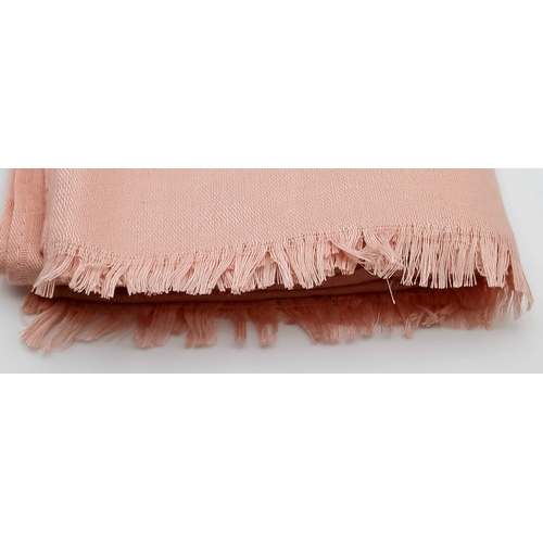 558 - A Fendi Pink FF Monogram Scarf. Soft pink fabric with tonal FF monogram throughout and fringed edges... 